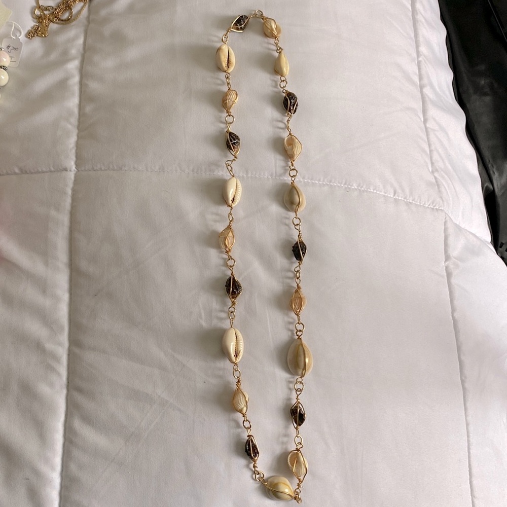 Long gold necklace